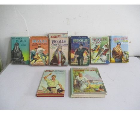 A collection of twenty three Biggles adventure books by Capt. W E Johns. Eleven in picture dust jackets. Twelve plain hardbac