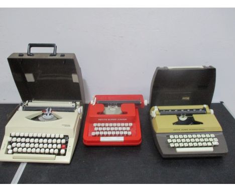 Three vintage typewriters- Imperial 2002, Petite Super International and Petite Super Junior