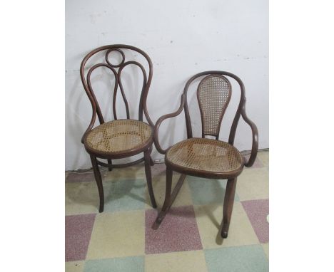 A vintage bentwood rocking chair along with a single bentwood chair