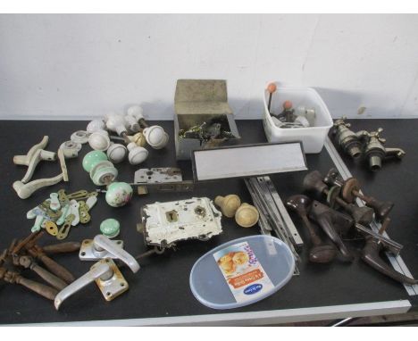 A collection of vintage door furniture etc.