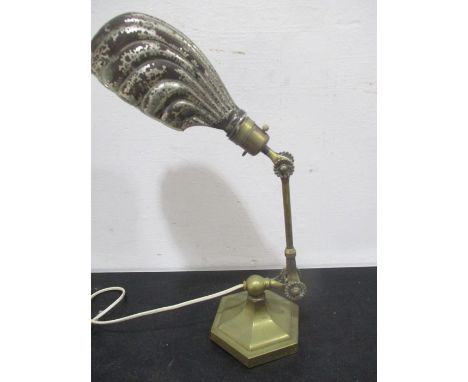 A Dugdill Patent brass adjustable desk lamp on hexagonal base with shell shaped shade
