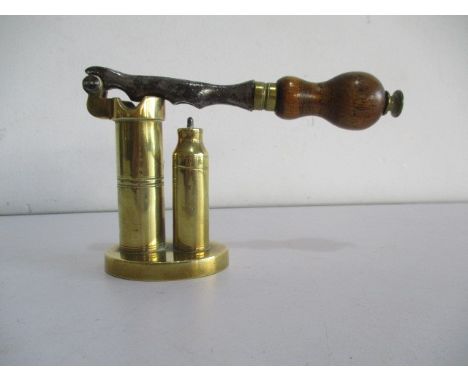 Brass and steel shot gun cartridge loading, decapping tool with wooden handle.