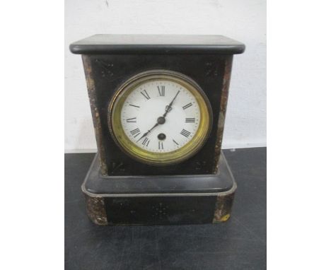 A small slate mantle clock