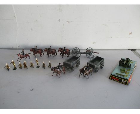 A collection of Britains die cast figures, gun carriage and horse drawn weapon plus a Dinky Toys six pounder anti tank gun