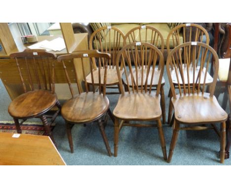 A set of five Air Ministry elm seat stick-back kitchen chairs and a pair of Ibex style stick-back kitchen chairs (7)