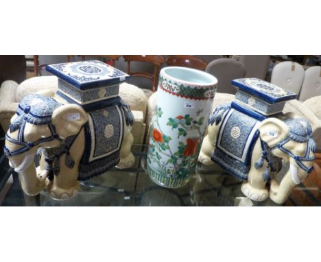 A pair of Oriental ceramic garden seats in the form of elephants and a Chinese enamelled stick stand (3)