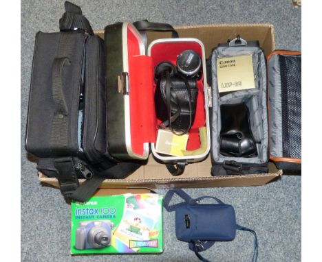 Three camera cases and contents including one Monopod and two cameras