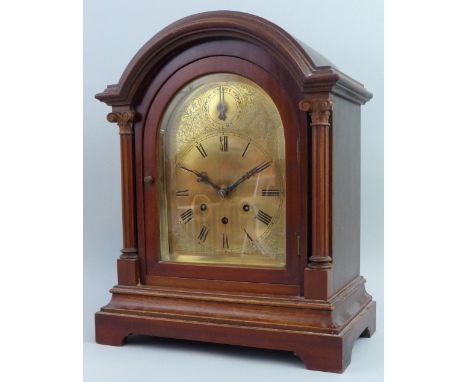 An early 20th century German mahogany mantel clock retailed by Hugh Rice, Hull, the brass dial with strike and silent subsidi