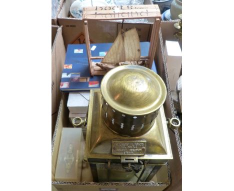 A brass cargo light and a quantity of nautical memorabilia, mainly P & O