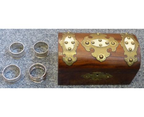 A Victorian walnut, brass and horn dome topped tea caddy, together with four silver napkin rings