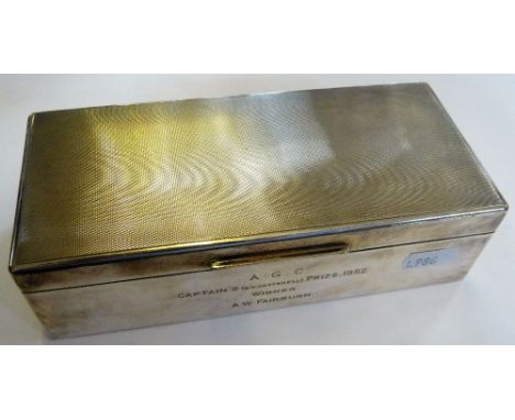 A silver presentation cigarette box London 1950 with engine turned cover