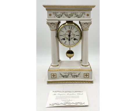 Porcelain 'Empress Josephine' Portico clock decorated with roses by 'Franklin Mint  H37cm