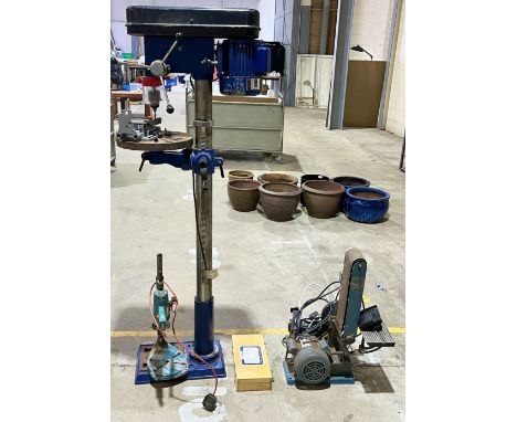 A large floorstanding Draper pillar drill along with a sander, grinder etc. 