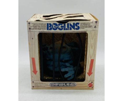 A boxed Mattel Boglins "Plunk" action figure puppet