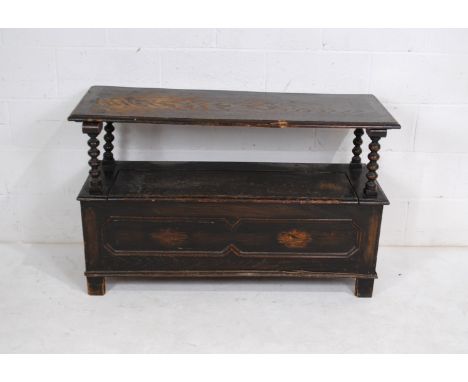 A Jacobean style oak monks bench, with bobbin turned supports and lift up seat - in need of some attention - length 122cm, de
