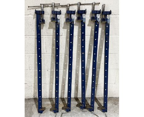 A collection of six sash clamps 