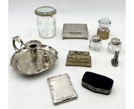 A collection of silver plated items etc. including a pair of inkwells, chamber stick, card case and two gilt mounted glass po