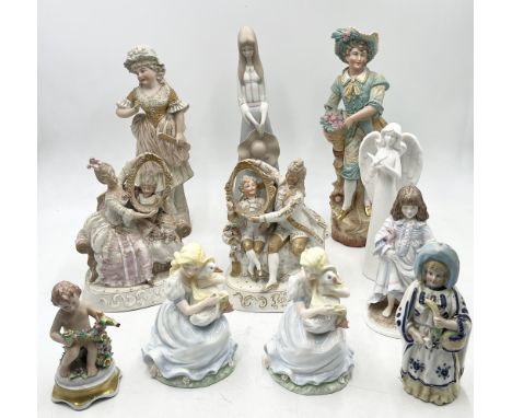 A collection of ceramic figures including Coalport, Royal Worcester etc.