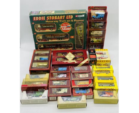 A collection of boxed die-cast vehicles including Corgi Eddie Stobart Ltd Motorway Truck Set & Playmat, Matchbox Models of Ye