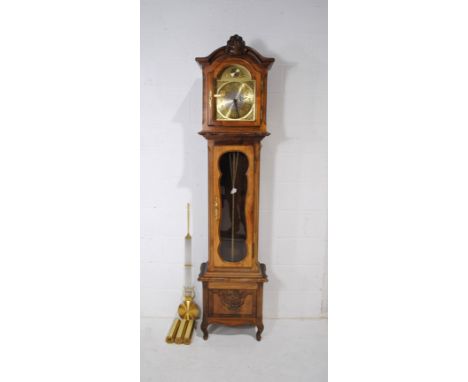 A modern longcase clock, with brass dial marked 'Tempus Fugit', with carved detailing - height 215cm