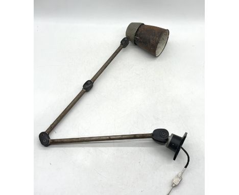 A vintage industrial desk lamp.