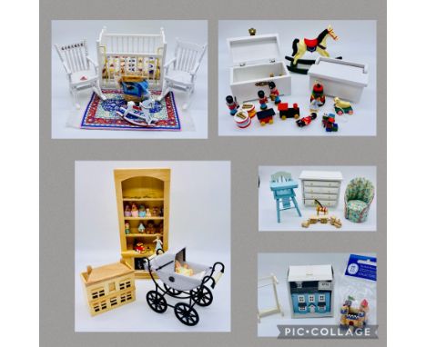 A collection of dolls house furniture relating to a nursery including a cot, bookcase with toys, chest of drawers, pram, rock