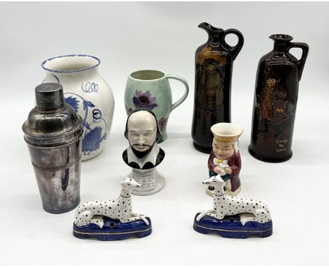 A collection of various china including Royal Doulton "Dewar's Whisky" jugs, Poole Pottery, Staffordshire style dalmatians et