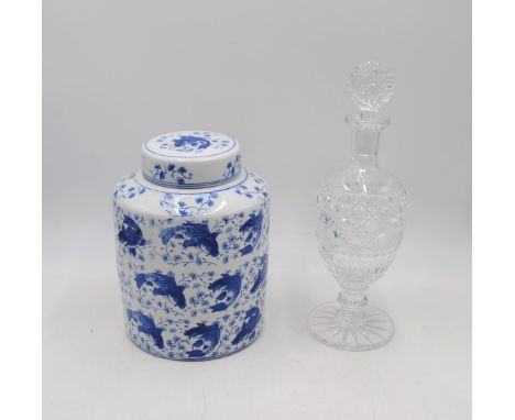 A 20th Century Chinese blue and white ceramic jar and cover, along with a cut glass decanter with stopper
