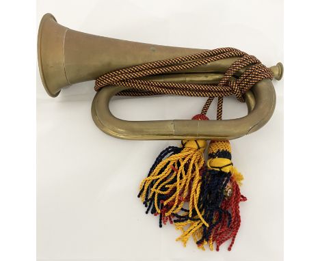 A vintage brass bugle