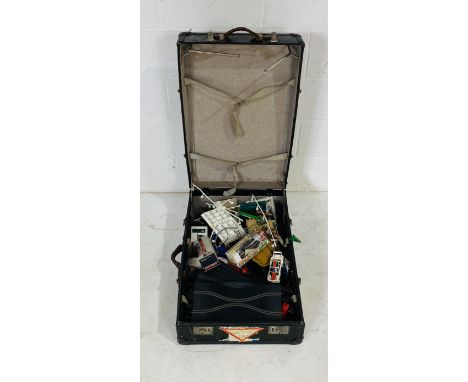 A large collection of loose vintage Scalextric including cars, controllers, track, buildings, scenery etc, all stored with a 