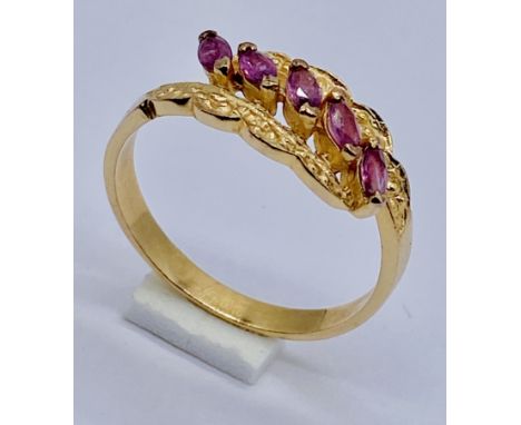 An 18ct gold ruby five stone ring, weight 2g, size P 1/2