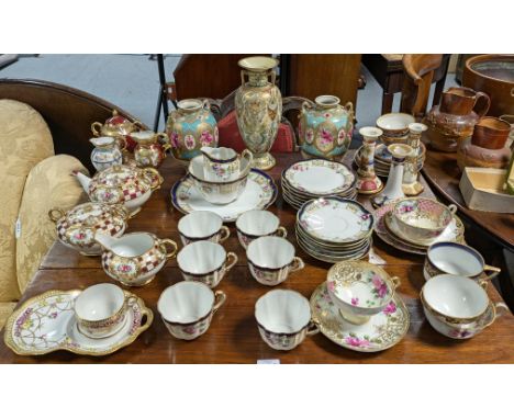 A Noritake floral decorated twenty-one-piece tea service (settings for six); four ditto vases; &amp; various other items of N