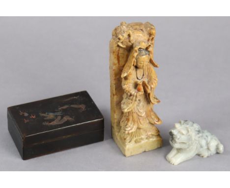A Chinese carved soapstone figure, 15cm high; a ditto model dog; &amp; a Chinese black lacquered trinket box with dragon deco