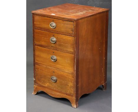 An early 20th century mahogany small upright chest fitted four long graduated drawers with brass oval ring handles, &amp; on 