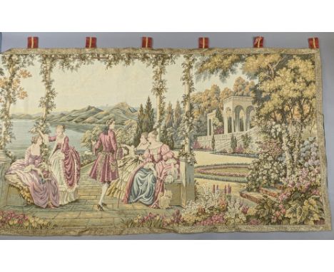 A late 18th/early 19th century-style tapestry depicting a garden landscape with numerous figures to the foreground, 328cm x 1