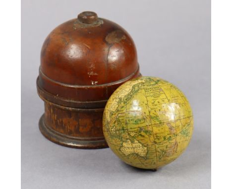A mid-19th century Newton’s New &amp; Improved 7cm terrestrial pocket globe (with numerous faults throughout), in a turned &a