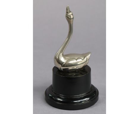A novelty silvered-metal “Swan” ring-holder on a Bakelite base, 14cm high.