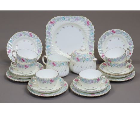 A Minton’s bone china “Printemps” twenty-one-piece tea service (settings for six). 