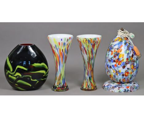 A large millefiori glass egg-shaped table lamp, 63cm high; a ditto pair of flared vases, 54cm high; &amp; a similar large art