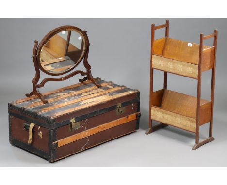 An oak dwarf standing two-tier bookcase, 42.5cm wide x 81cm high; together with a mahogany oval swing toilet mirror, 50cm wid