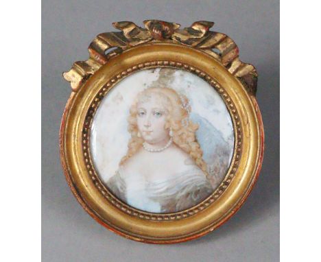 ENGLISH SCHOOL, 18th century. A portrait miniature of a lady wearing string of pearls, her blonde hair in curls, signed indis