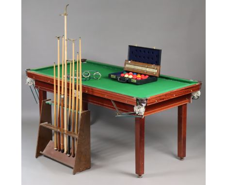 A modern slate-bed quarter-size snooker table inset green baize; &amp; on four mahogany square legs, 180cm long x 87cm high x