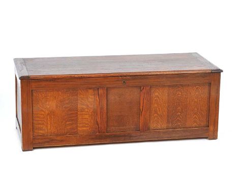 OAK TRUNK, PANELLED FRONT & BACK.HEIGHT: 18 INCHESWIDTH: 48 INCHESDEPTH: 20 INCHESGOOD CONDITION