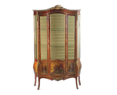 BOW FRONTED FRENCH SINGLE DOOR VITRINE WITH PAINTED PANELS & GILT METAL MOUNTS ON FOUR SPLAYED LEGS FITTED WITH TWO GLASS SHE