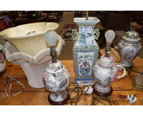 20TH CENTURY CHINESE DOUBLE HANDLED VASE DECORATED WITH FLOWERS AND BIRDS, LATER CONVERTED TO A TABLE LAMP, TOGETHER WITH TWO