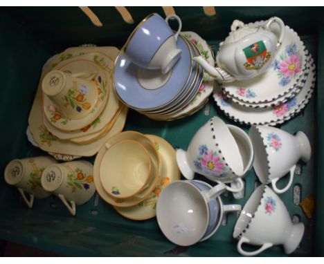 A set of four Art Deco Staffordshire hand painted teacups, saucers and tea plates, angular handles; other similar early 20th 