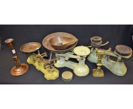 A set of kitchen weighing scales and weights; two others, similar