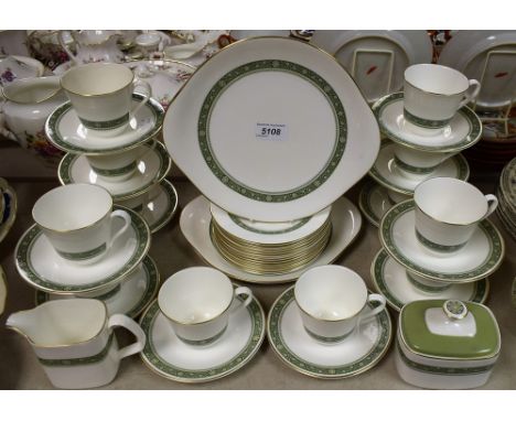 A Royal Doulton Rondelay pattern tea set, comprising twelve teacups, saucers and side plates, milk and sugar, pair of cake pl