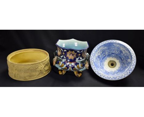 A Victorian game pie dish; a Victorian majolica jardiniere moulded with grotesque bird masks; a Victorian blue and white tran