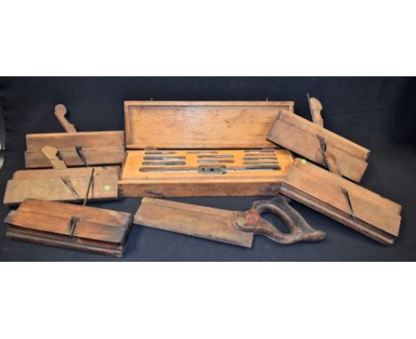 Tools - a cased tap and die set; moulding planes; saw; etc.